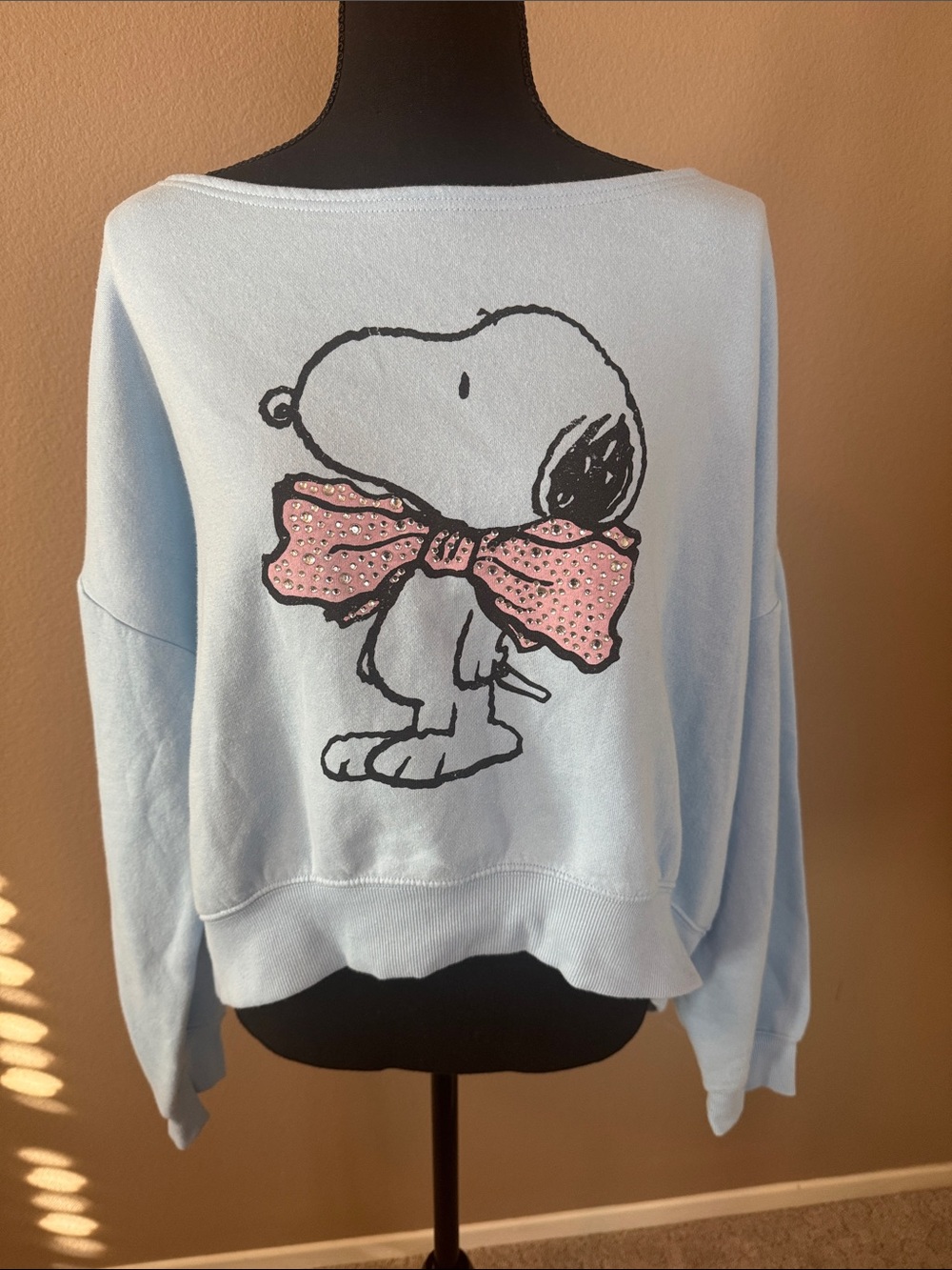 Peanuts Light Blue Off-the-Shoulder Snoopy Rhinestone Sweatshirt with Pink Bow